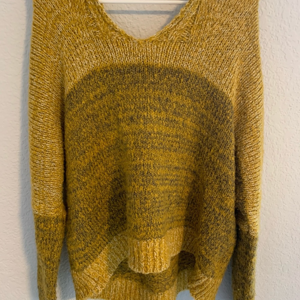 A cozy, comfy, soft sweater. Cute and nice.